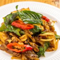 Pad Kee Mao · Stir-fried flat noodle with basil, garlic, pepper, mushroom, and onion in chilli paste.