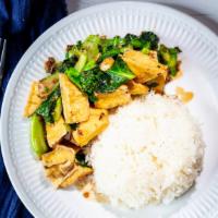 Crispy Tofu And Chinese Broccoli Over Rice · Stir-fried fresh cut Chinese broccoli and tofu with garlic sauce.
