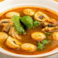 Tom Yum Soup · Spicy. Authentic hot and sour soup, chilli, mushroom, lemongrass, and lime juice.
