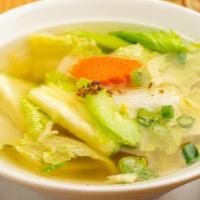 Vegetable Ginger Soup · Assorted vegetables in clear broth.