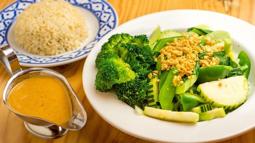 Healthy Greens · Steamed mixed vegetables, peanut sauce, and brown rice.