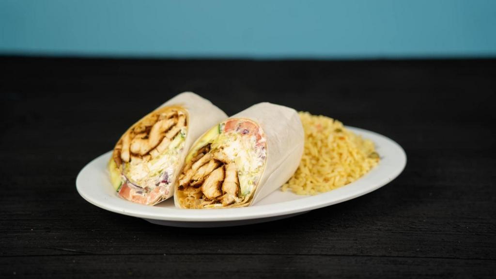 Grilled Chicken Greek Salad Wrap · Grilled chicken and greek salad mix with vinaigrette or tzatziki sauce in your choice of wrap
