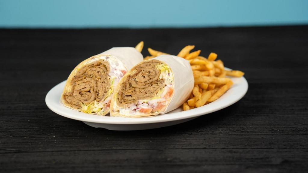 Gyro (Beef & Lamb) Wrap · Gyro meat, tomatoes, red onions and tzatziki in your choice of wrap.