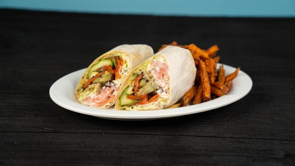 Grilled Vegetables Wrap · Grilled Zucchini, Red Peppers, Eggplant, tomatoes, red onions and tzatziki in your choice of wrap.