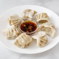 Fried Or Steamed Dumpling 锅贴或者水饺 · 8 pieces. Choice Steamed or Fried