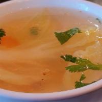 Vegetable Soup · Homemade clear soup with fresh onion, carrot, napa, celery, and garlic oil.