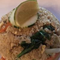 Crab Fried Rice · Crab meat, egg, Chinese broccoli, onion, and scallion.