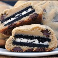 Ultimate Cookie Bar · Layers of our chocolate chip cookie dough filled with oreo cookies. The ultimate cookie bar!