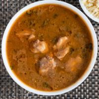 Chicken Curry · South Indian dish produced from a wide range of oriental spices and flavors.