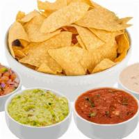 The Chips Spread · Includes a Large Bag of Freshly Fried Chips (12oz), 8oz of Freshly Prepared Guacamole, 8oz o...