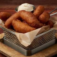 Crispy Hush Puppies · Served with Maple Syrup Butter