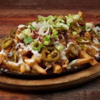 Trainwreck Fries · Melted Cheddar, Jack Cheese, Smoked Bacon, Scallions, & Jalapenos with Ranch Dressing