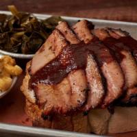 Texas Beef Brisket · Slow smoked, sliced to order & finished with Virgil's barbecue sauce