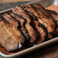 Texas Beef Brisket (Lb) · Approx. 1lb of our Slow Smoked, Sliced to Order & Finished with Virgil’s Barbecue Sauce