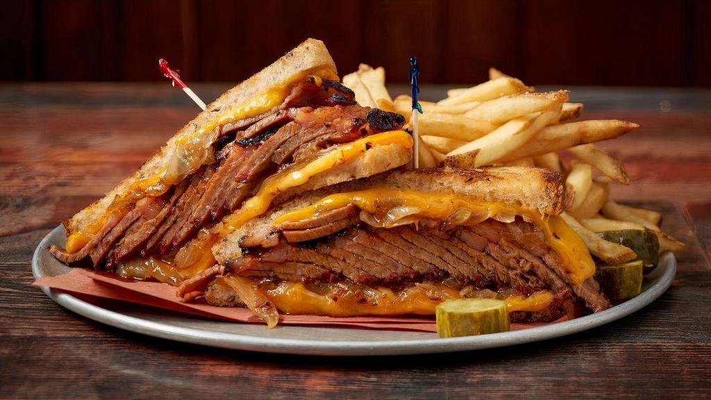 Texas Beef Brisket Melt · Slow Smoked Texas Beef Brisket on Rye with Melted Cheddar Cheese & Grilled Onions
