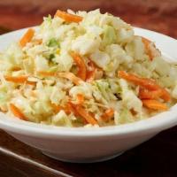 Cole Slaw · Creamy Cole slow with a Fresh Tangy Bite - Made with a Combination of Mayo, Mustard, & Bread...