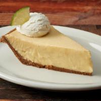 Key Lime Pie · Graham Cracker Crust Filled with Fresh Key Lime & Baked Topped with Fresh Whipped Cream