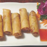 Vegetable Spring Rolls  · Vegetarian. Cabbage, carrot, and celery served with sweet chili sauce.