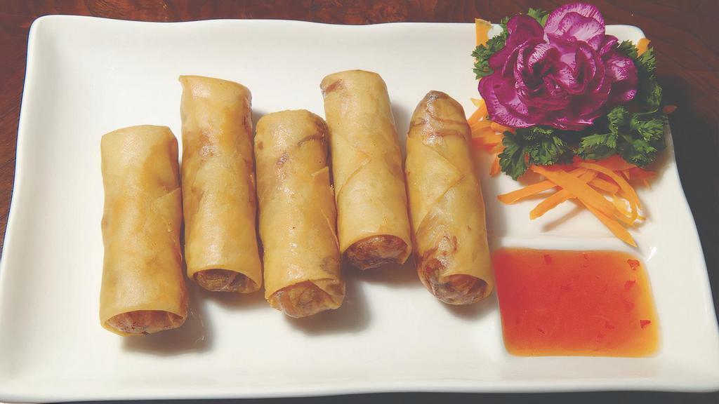 Vegetable Spring Rolls  · Vegetarian. Cabbage, carrot, and celery served with sweet chili sauce.