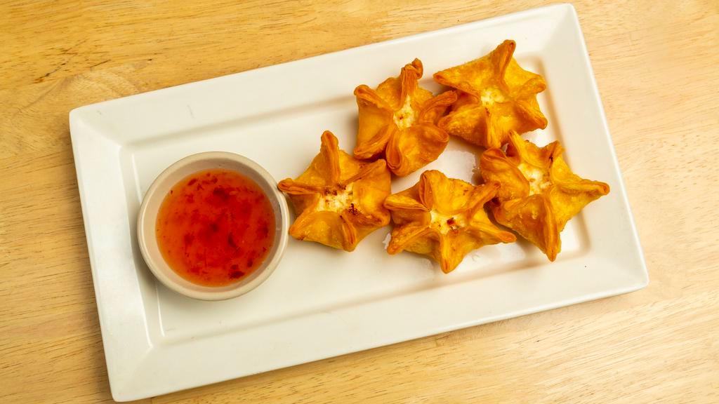 Crab Rangoon  · Crispy Wonton filled with cream cheese, carrot, celery, and imitated crab.