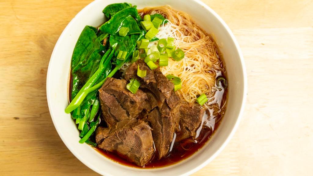 Classic Beef Pho · Vietnamese rice noodles in a beef broth with thinly sliced beef, cilantro, basil, scallions, and bean sprout.