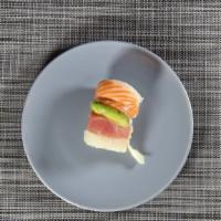 Rainbow Roll · Top: tuna, white fish, salmon, mackerel; California roll inside.