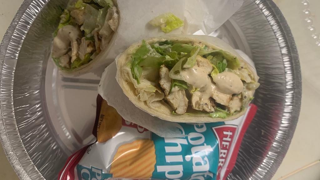 Grilled Chicken Caesar Wrap · With romaine lettuce and creamy caesar dressing.