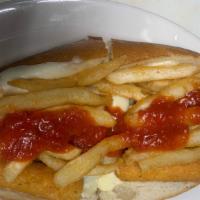 Fat Sam · Chicken cutlet with two mozzarella sticks, French fries and marinara sauce.