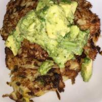 Vegan Mexican Latkes (Avocado, Onions & Cilantro) (1) · Shredded potatoes with cilantro, roasted corn and onions, topped with avocado hummus, choppe...