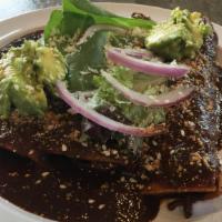 Chicken Mole Enchilada, Red Onions, Avocado & Cotija Cheese (1) · 3 pieces corn tortillas stuffed with chicken mole toppings of avocado, red onions and cotija...