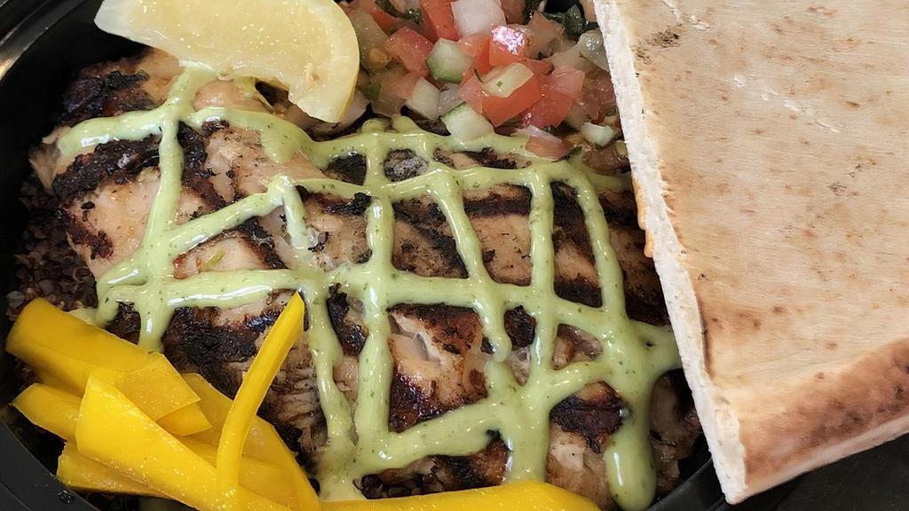 Fish Bowl (1) · Grilled Tilapia, your choice of grain with Israeli salad, Pickled Mango, Lemon and zhoug mayonnaise, 1/2 of pita bread
