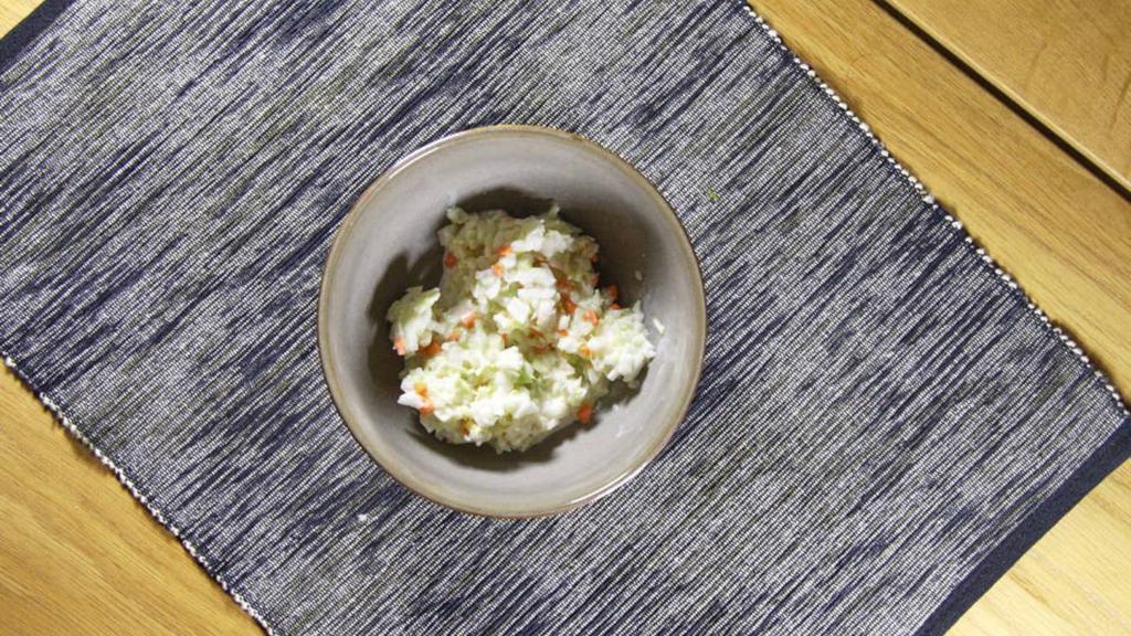 Creamy Coleslaw · With carrots, onions and cabbage.