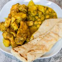 Roti Or Rice & Curry Chicken  · Paratha roti with curry chicken on the side