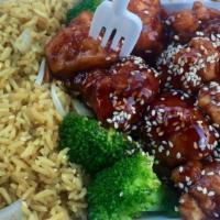 Sesame Chicken Combination · Served with pork fried rice or brown rice or white rice and egg roll.