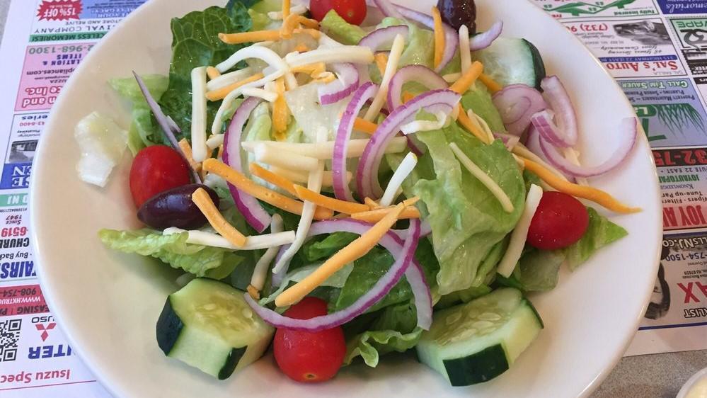 House Salad · Mixed greens, tomato, Cucumber, carrots, peppers, and onions.
