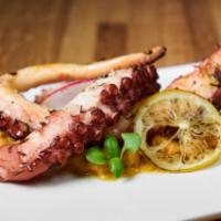 Polpo Alla Griglia · Grilled octopus served with grilled seasonal vegetables
