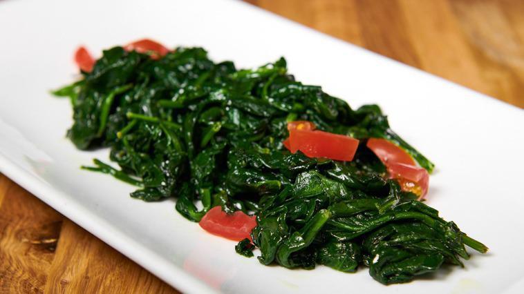 Spinaci Saltati · Sautéed spinach in garlic and extra virgin olive oil