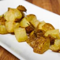 Patate Al Forno · Roasted Idaho potatoes with rosemary and pink salt