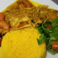 Curry Fish Meal · Curry fish serve with rice and peas, white rice, bammy, festival, salad, plantains or steame...