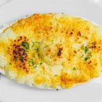 Shepherd'S Pie · Ground beef, peas & carrot topped with mashed potato gratinée