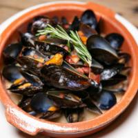 Mussels Provencal · Sautéed mussels in white wine, tomato, garlic, shallots, parsley & french fries.