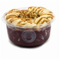 Power Bowl · Pure acai with chocolate protein topped with granola, banana, peanut butter.