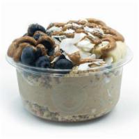 Olas Bowl · Banana blend topped with granola, banana, blueberry, coconut flakes, chia seeds, and almond ...