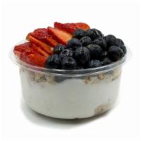 Coco Berry Coconut Bowl · Coconut blend topped with granola, blueberry, strawberry, and honey. Coconut bowl is blended...