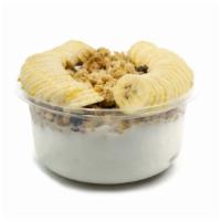 Coco Bowl · Coconut blend topped with granola, banana, honey.