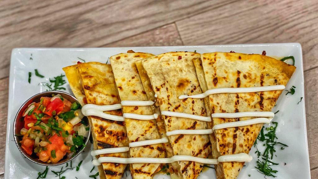 Quesadilla · Cheese quesadilla with your protein option served with rice and beans pico and sour cream