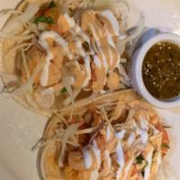Shrimp Taco · Mixed cabbage, pico de gallo, sour cream, chipotle sauce.