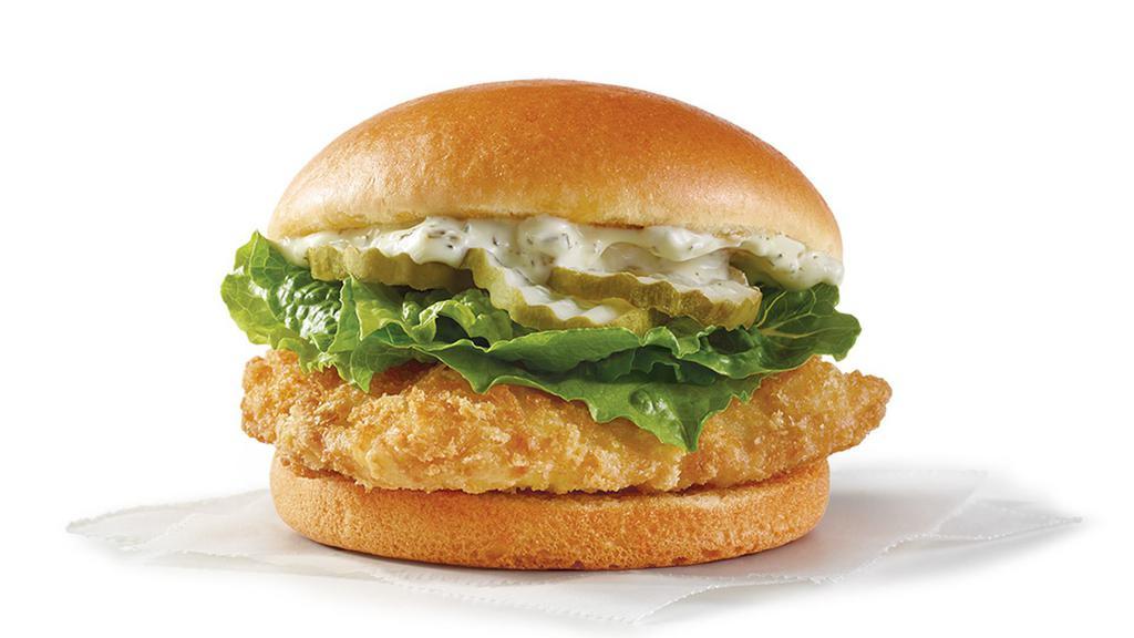 Crispy Panko Fish Sandwich · Wild caught Alaskan pollock fillet, crunchy panko breading, topped with creamy dill tartar sauce, pickles, lettuce, and American cheese. Proof that ice fishing is actually totally worth it.