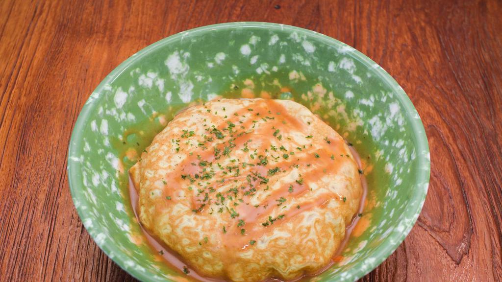 Omurice / 오므라이스 · Sweet sour, and savory fried rice packed with ham, bacon, vegetables wrapped in a soft and thin omelette & miso soup.