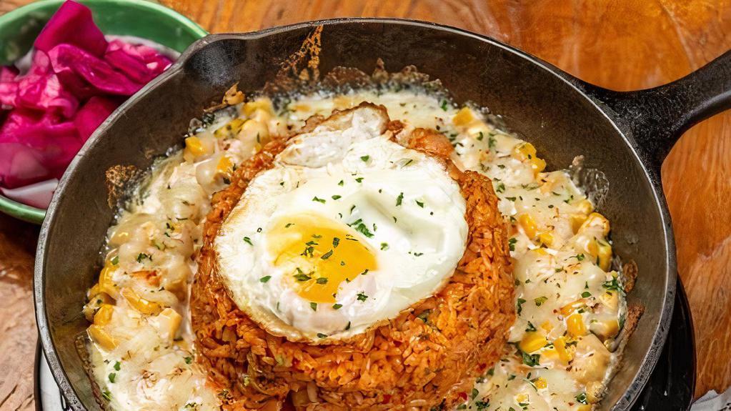 Kimchi Fried Rice With Corn & Cheese (콘치즈 김치 볶음밥) · Fried kimchi, ham, bacon, fried egg with rice, and miso soup.